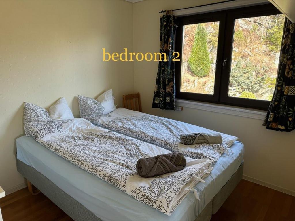Posteľ alebo postele v izbe v ubytovaní Florvåg -flott utsikt mot byen
