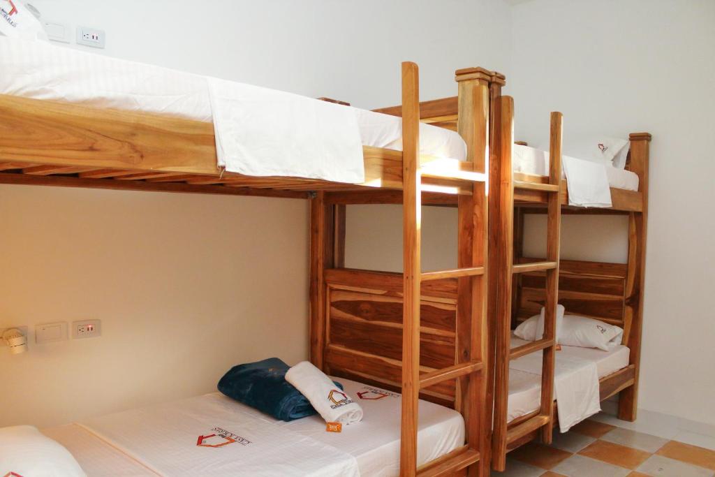 Postel nebo postele na pokoji v ubytování Hostal Casa Torres Centro Historico - Adults Only