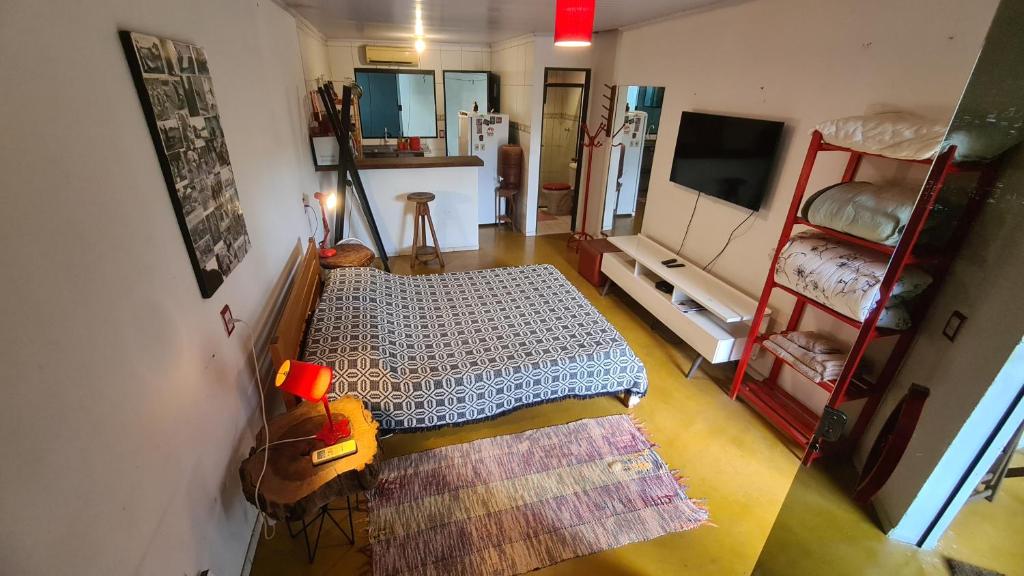 an aerial view of a room with a living room at Villa Guará - Vila de São Jorge in Alto Paraíso de Goiás