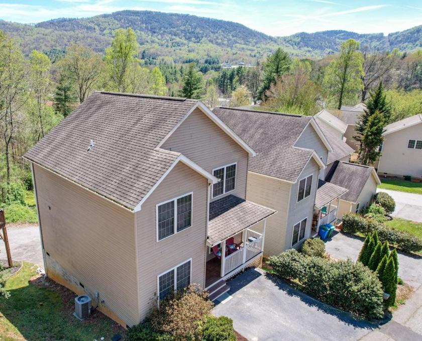 an aerial view of a house with at Spacious Mountain House - 10 minutes from Asheville & Biltmore! in Asheville
