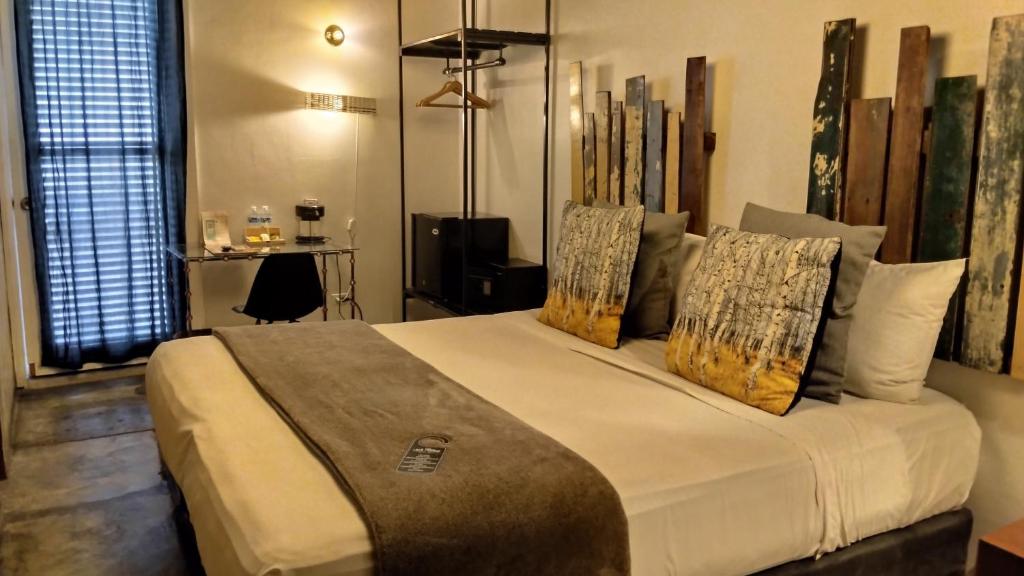 Postel nebo postele na pokoji v ubytování Hotel Casa Panama