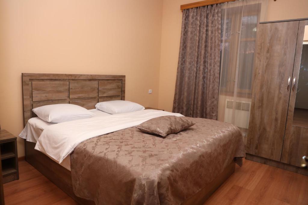 Postel nebo postele na pokoji v ubytování Getap