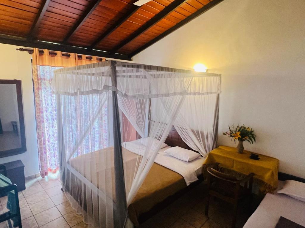 Postel nebo postele na pokoji v ubytování Ambiente Guest House