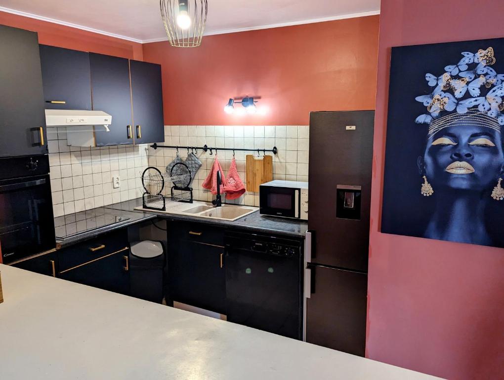 Fotografia z galérie ubytovania L'evasion, Cergy, Downtown, 6 pers, 2 min RER A, 2 places de parking privatives, Netflix et BeinSports v destinácii Cergy