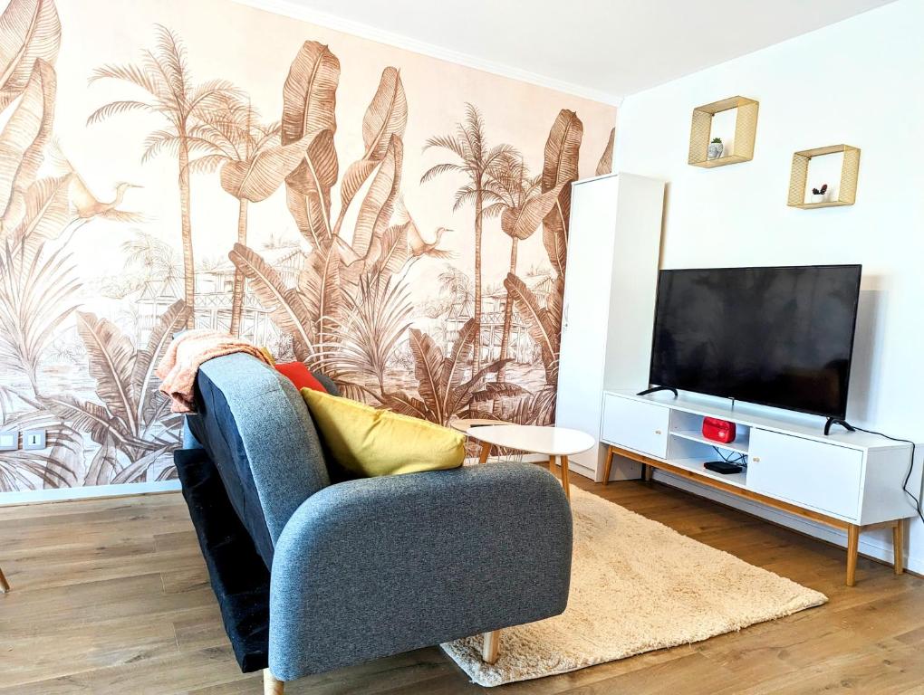 Fotografia z galérie ubytovania L'evasion, Cergy, Downtown, 6 pers, 2 min RER A, 2 places de parking privatives, Netflix et BeinSports v destinácii Cergy