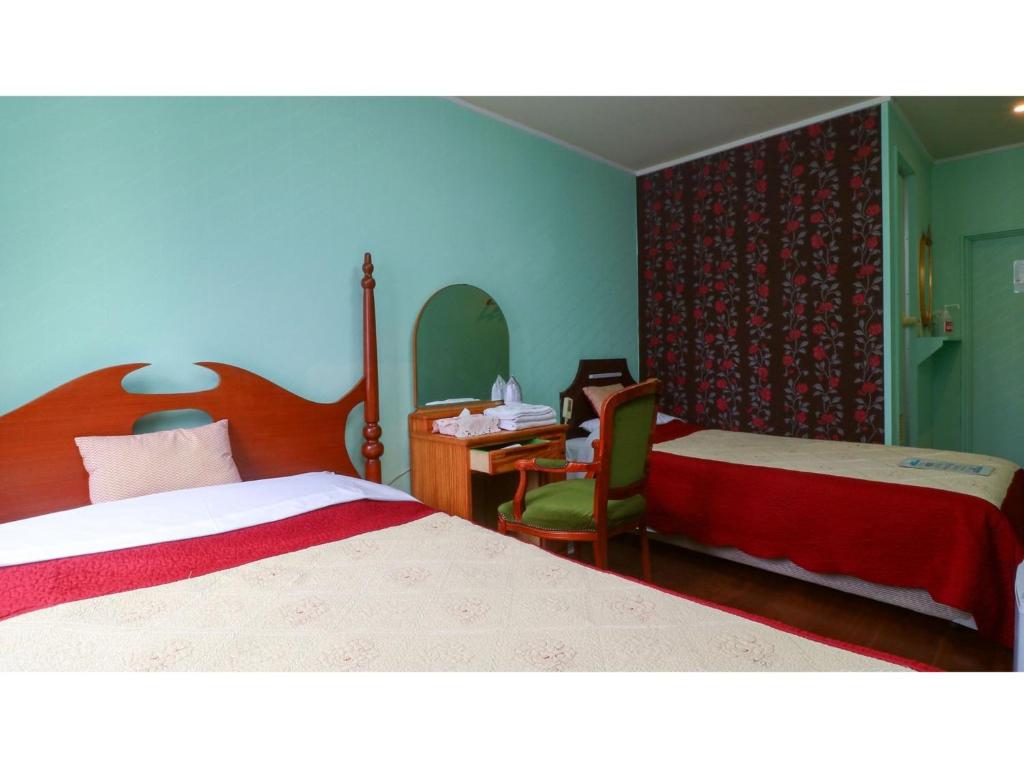 Un pat sau paturi într-o cameră la Nikko Park Lodge - Vacation STAY 15302v