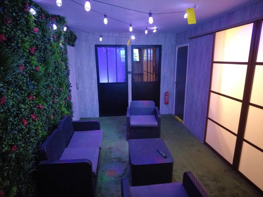 Posedenie v ubytovaní Le Jardin d'Eden -Appartement de charme avec Sauna, Hammam, spa