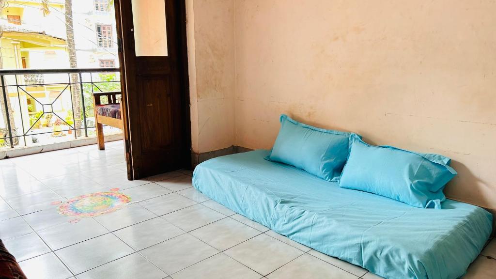 Postel nebo postele na pokoji v ubytování Muffys Apartment