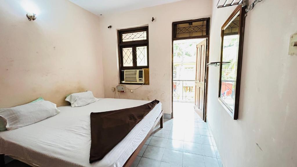 Postel nebo postele na pokoji v ubytování Muffys Apartment