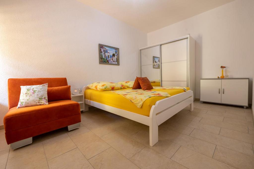 Ліжко або ліжка в номері Apartmani Soldan