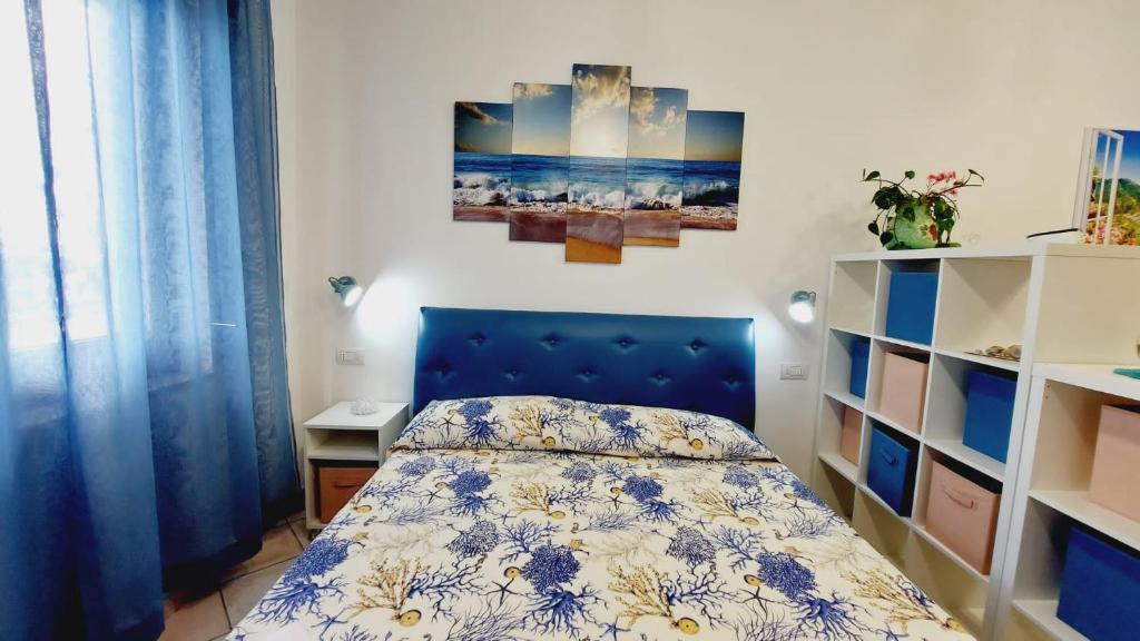 A bed or beds in a room at Al lungomare