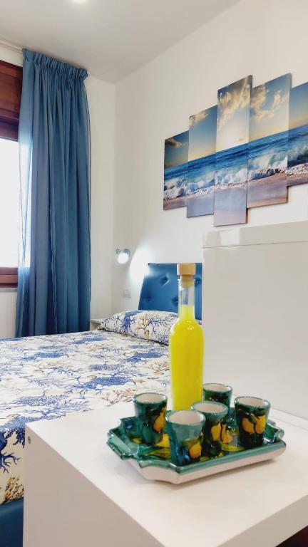 A bed or beds in a room at Al lungomare