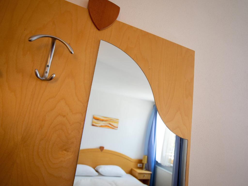 Postel nebo postele na pokoji v ubytování Bad Kochenmoos