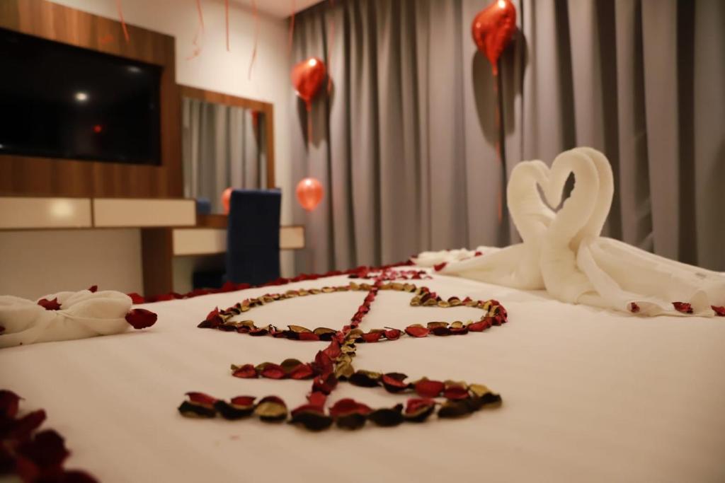 Postel nebo postele na pokoji v ubytování Tulip View Hotel