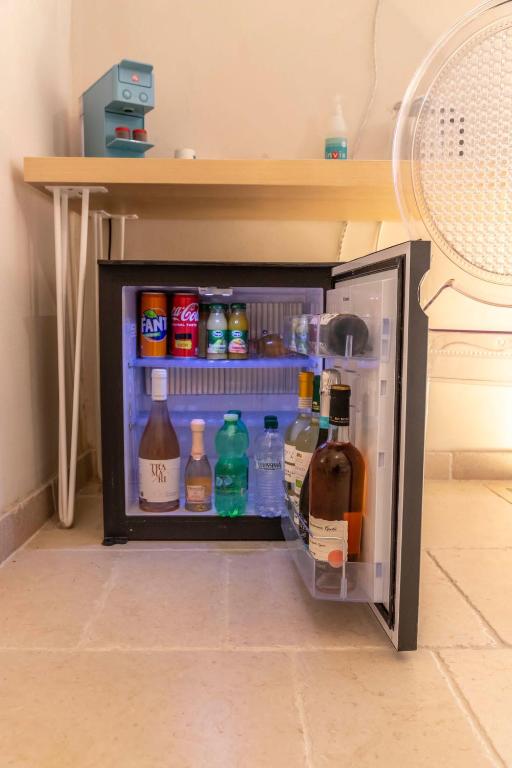 Kuchyň nebo kuchyňský kout v ubytování Cà sotto l’arco
