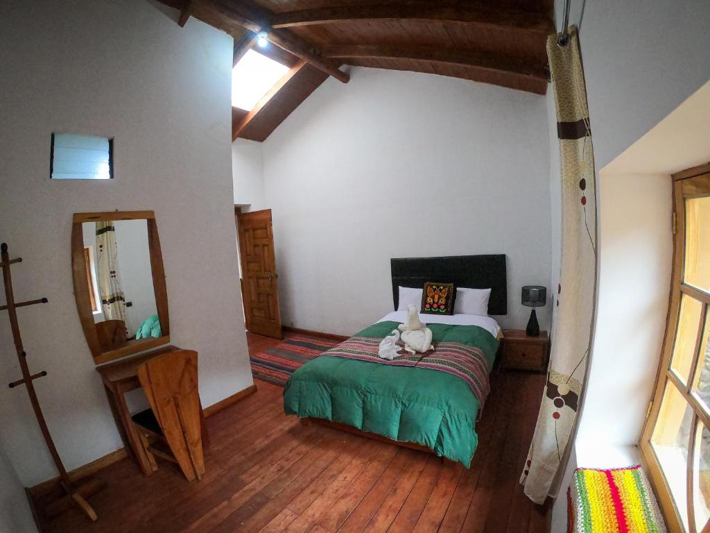 Postel nebo postele na pokoji v ubytování Hotel Inka King
