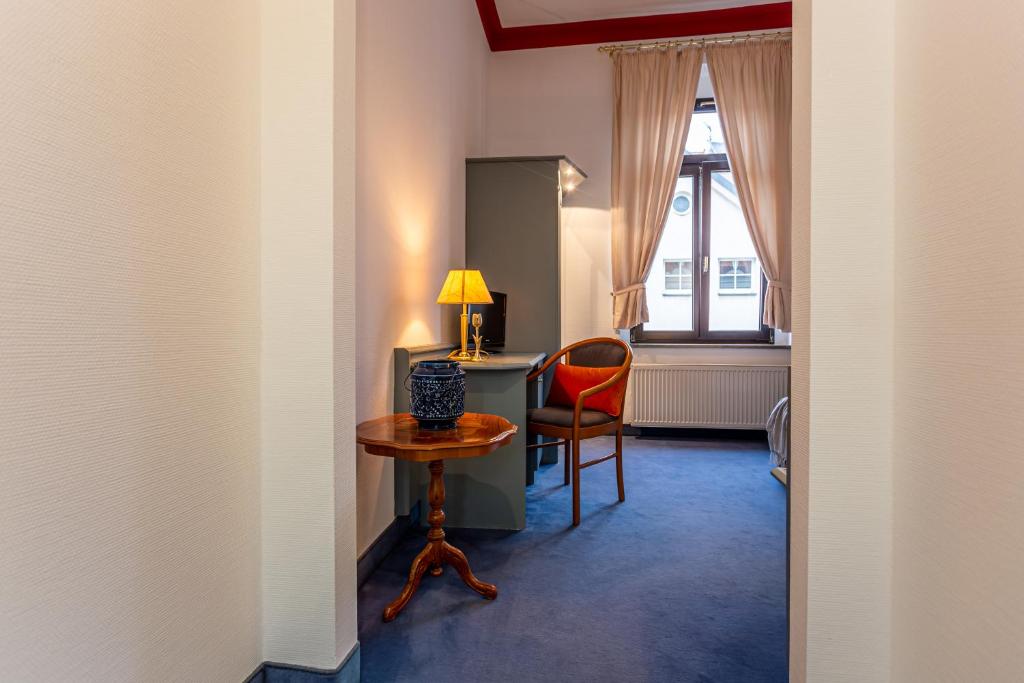 Posezení v ubytování Hotel Mauritius - Im Herzen von Crimmitschau - Frühstück buchbar - Restaurant - Café - Fahrradbox