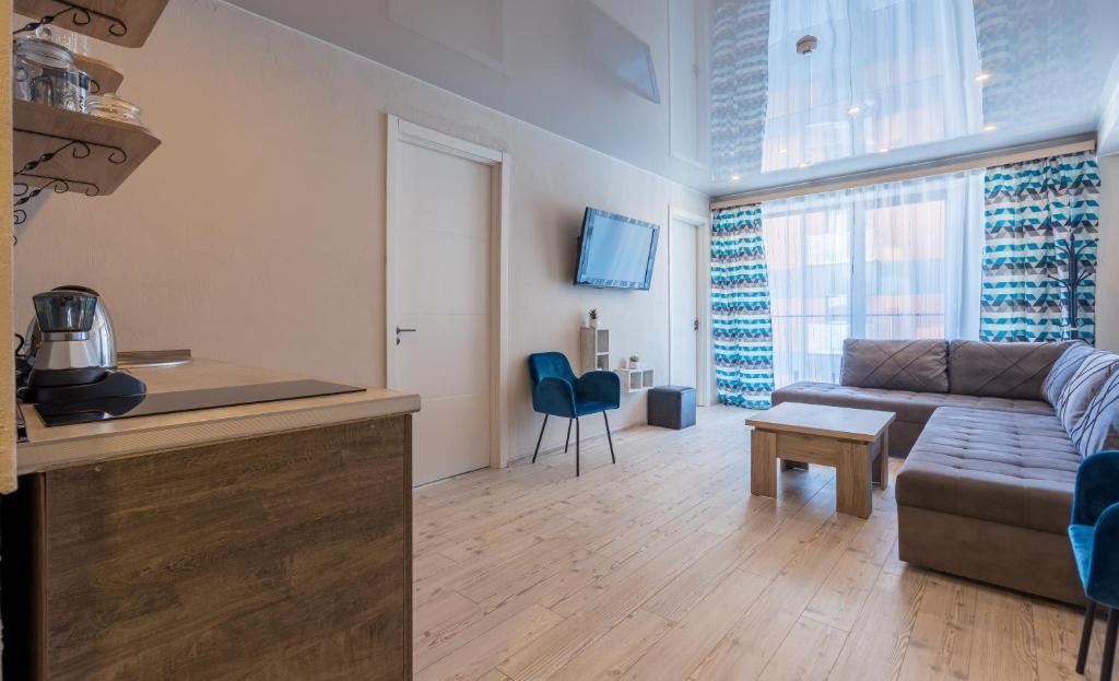 TV a/nebo společenská místnost v ubytování New Gudauri Atrium