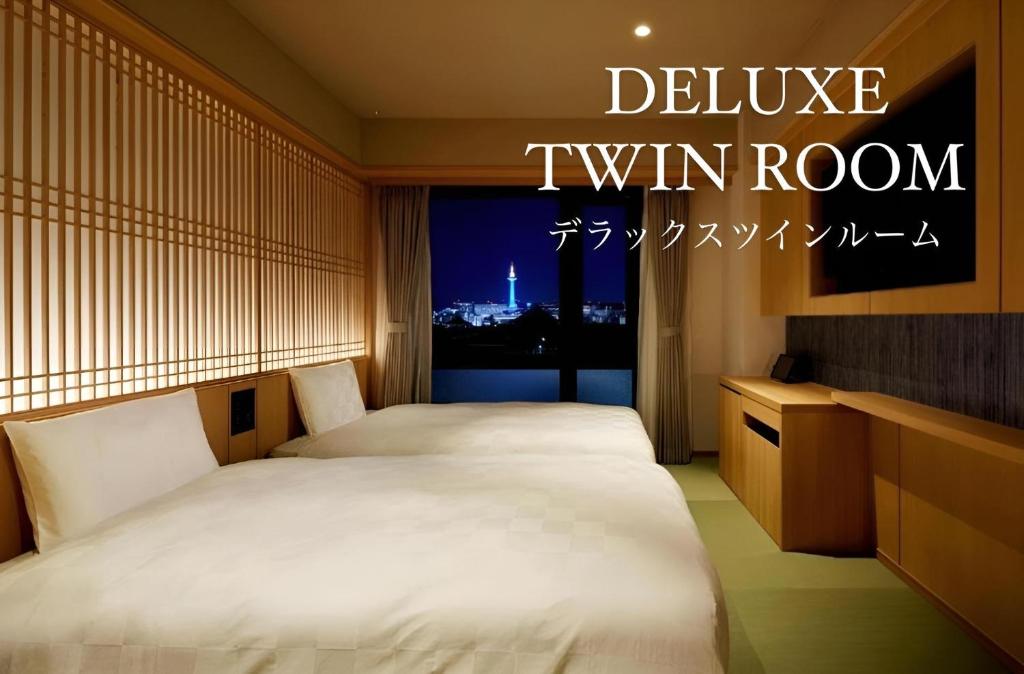 Postel nebo postele na pokoji v ubytování Henn na Hotel Premier Kyoto Gojo Karasuma -Formerly Watermark Hotel Kyoto-