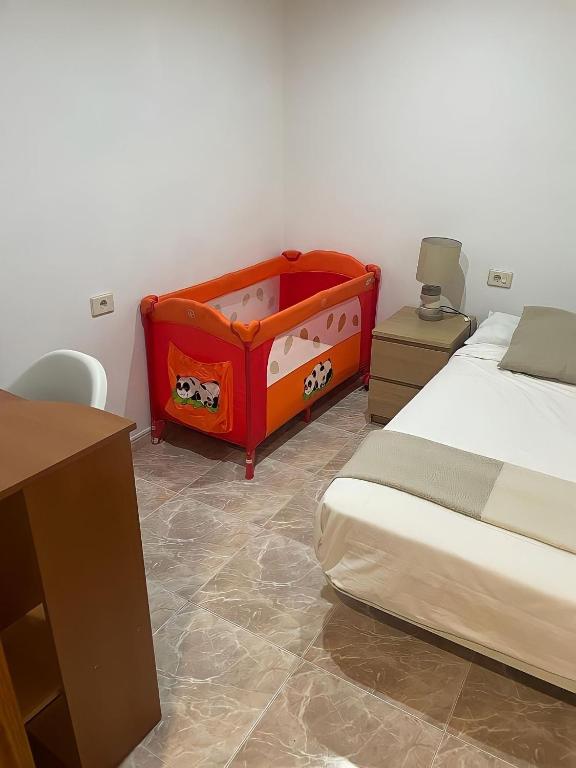 Posteľ alebo postele v izbe v ubytovaní Apartamento vacacional en O Grove