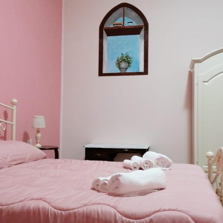 Łóżko lub łóżka w pokoju w obiekcie Mandevilla Home