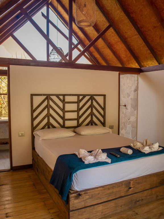 Postel nebo postele na pokoji v ubytování All Natural Glamping