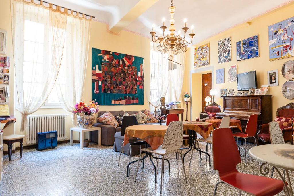 a living room filled with furniture and decor at La Gemma Di Elena in Lucca