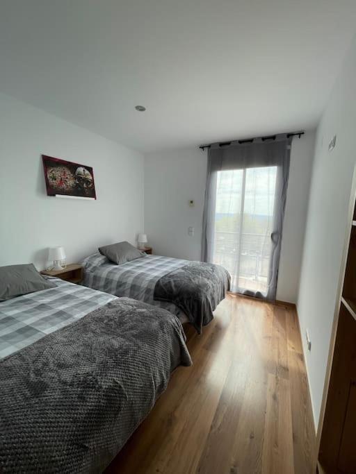 Postel nebo postele na pokoji v ubytování Casa para 8 personas en Berga - ALBERGA