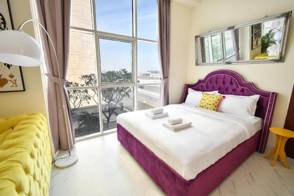 Кровать или кровати в номере Scala Tower Central Chic with a twist studio