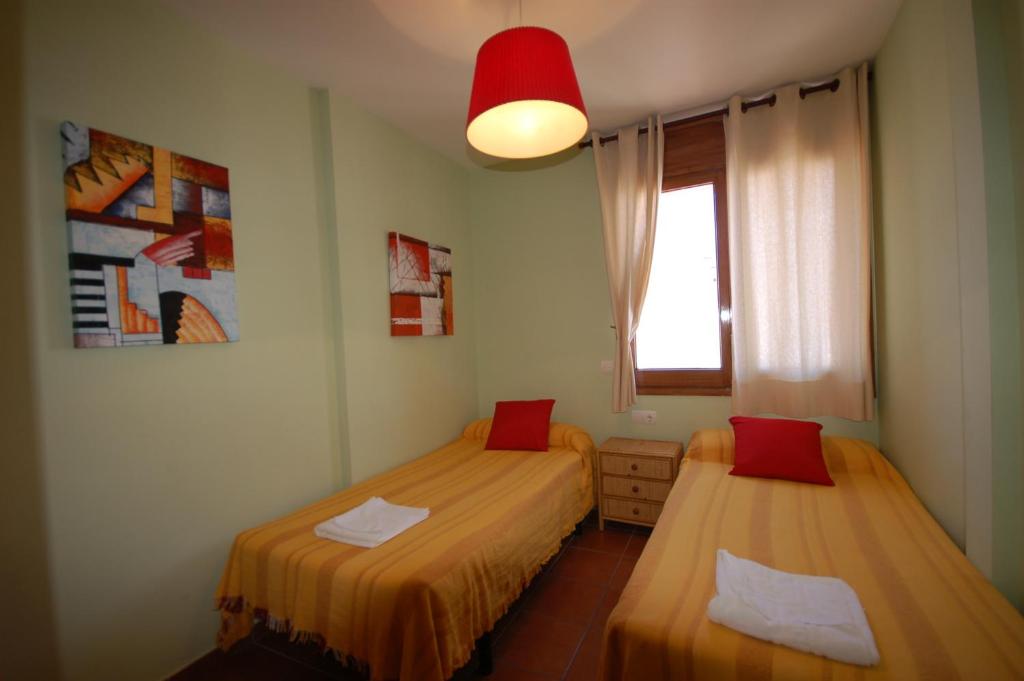 Postel nebo postele na pokoji v ubytování Sitges Apartment