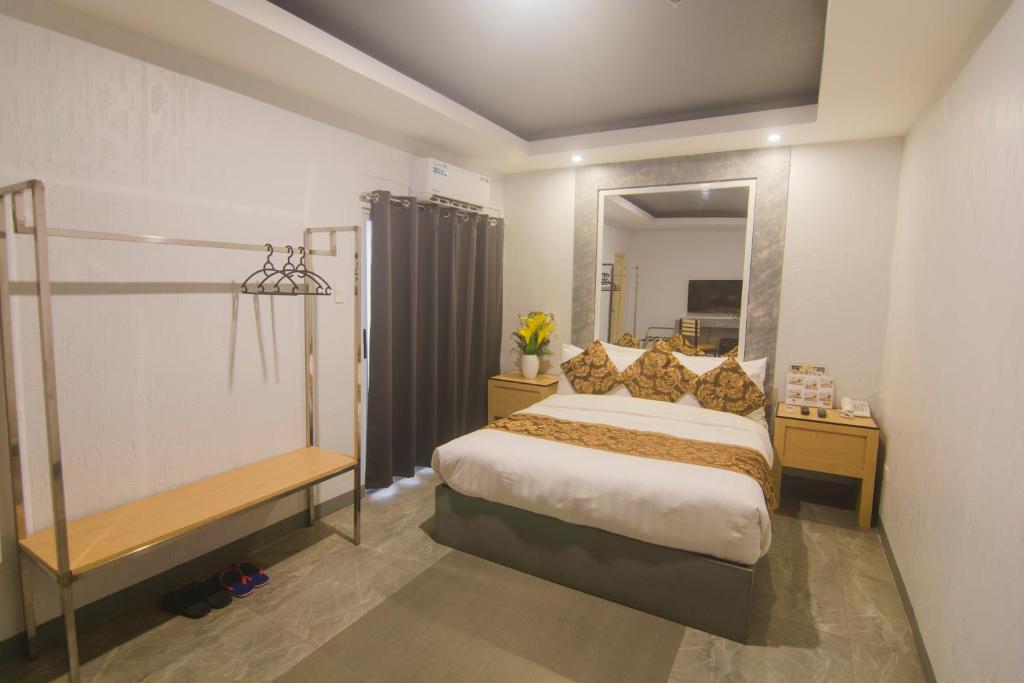 Postel nebo postele na pokoji v ubytování Hotel Carmelita
