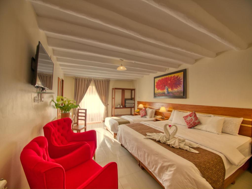 Voodi või voodid majutusasutuse Sol Ollantay Boutique Hotel toas