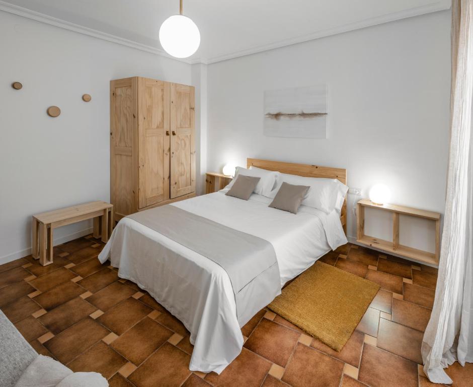 Postel nebo postele na pokoji v ubytování Oteses11