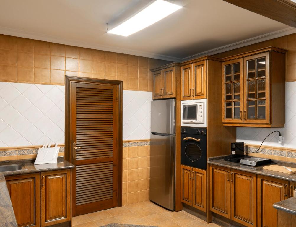 Kuchyň nebo kuchyňský kout v ubytování Oteses11
