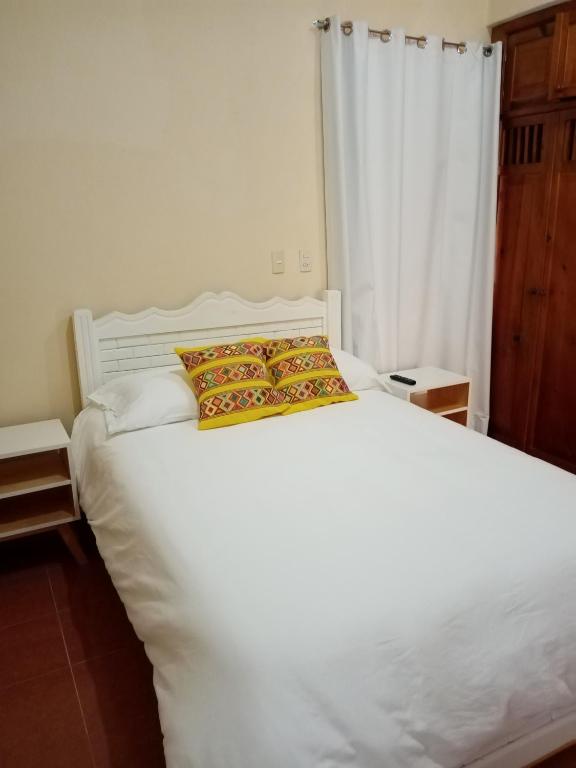 Postel nebo postele na pokoji v ubytování J&K Suite