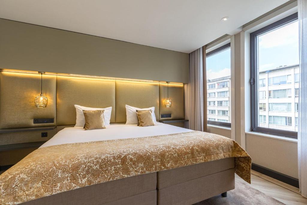 Postel nebo postele na pokoji v ubytování Leonardo Hotel Antwerp The Plaza