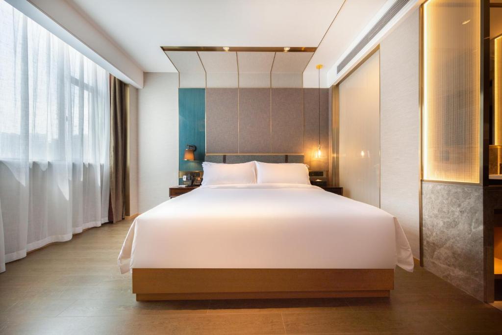 Paco Hotel Guangzhou South Railway Station Panyu Changlong Branch - Salle De Reine Supérieure