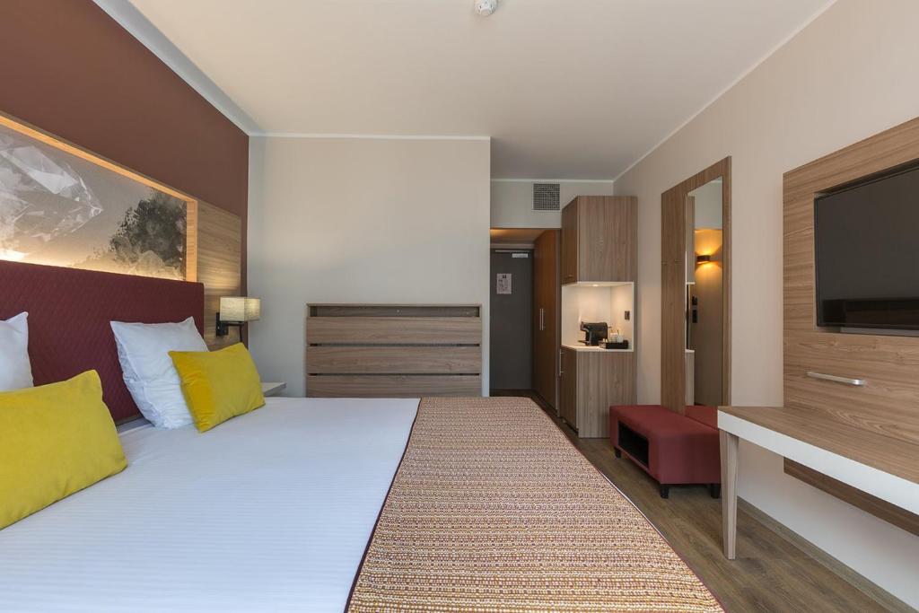 Una cama o camas en una habitación de Leonardo Hotel Antwerpen