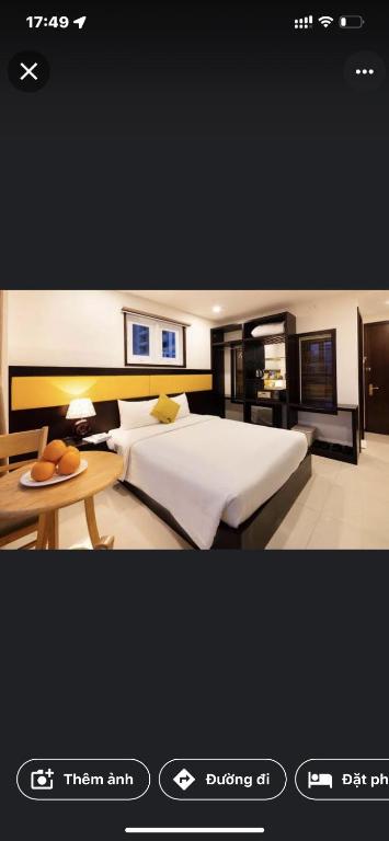 Postel nebo postele na pokoji v ubytování Tokia hotel nha trang