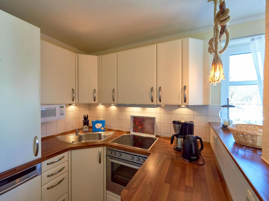 Kuchyň nebo kuchyňský kout v ubytování Dünenresidenz Königin Augusta - Apt. 17