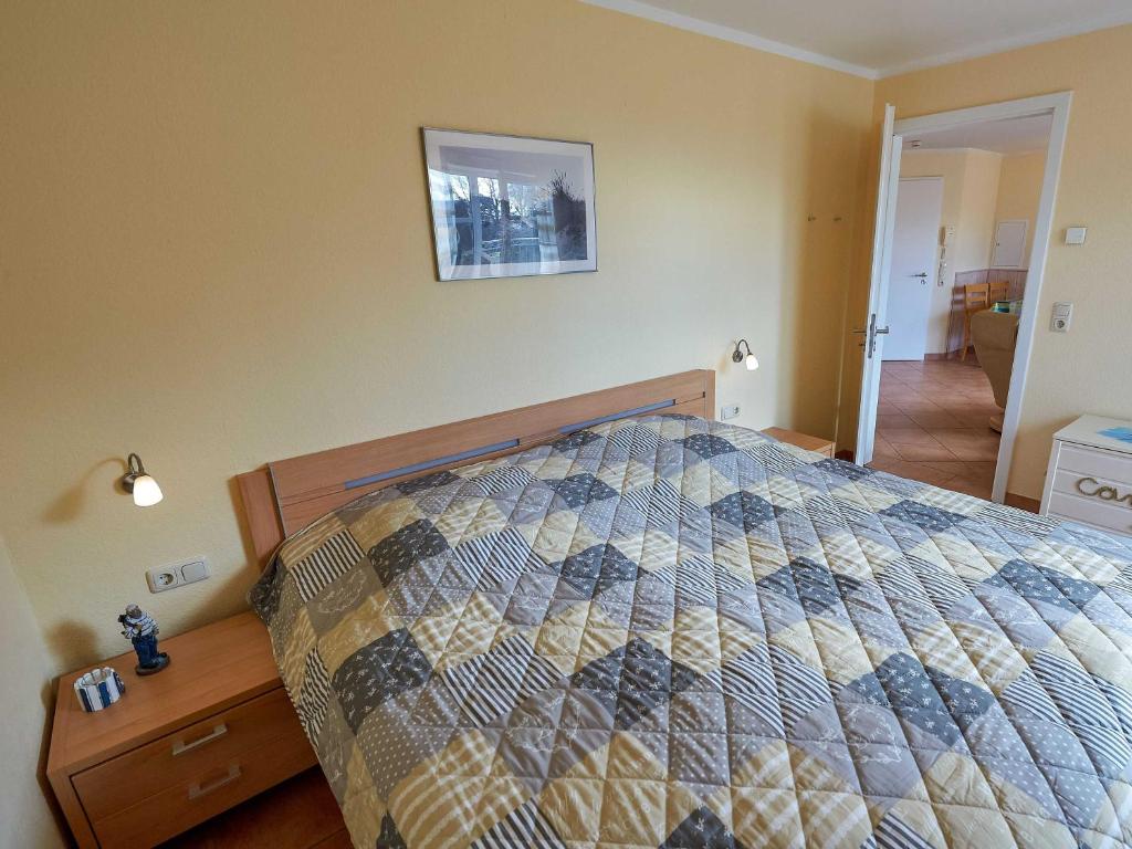 Postel nebo postele na pokoji v ubytování Dünenresidenz Königin Augusta - Apt. 17