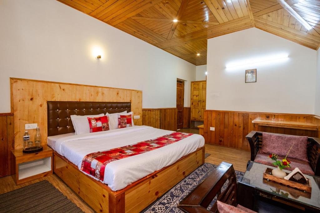 Postel nebo postele na pokoji v ubytování Tripli Hotels Conifer Wood Cottage