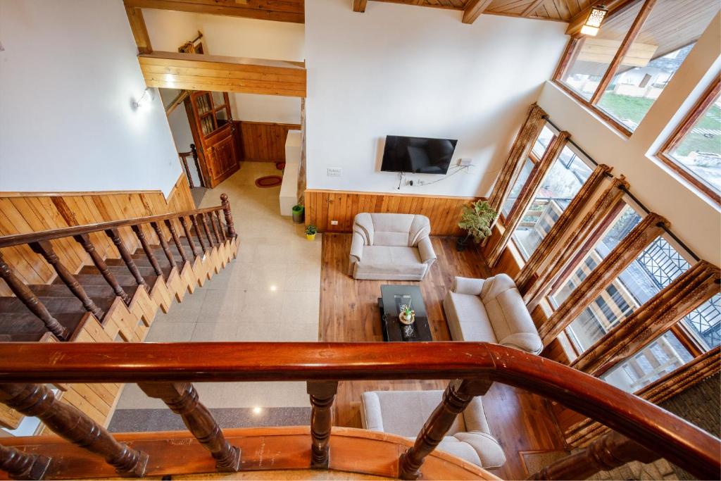 TV a/nebo společenská místnost v ubytování Tripli Hotels Conifer Wood Cottage