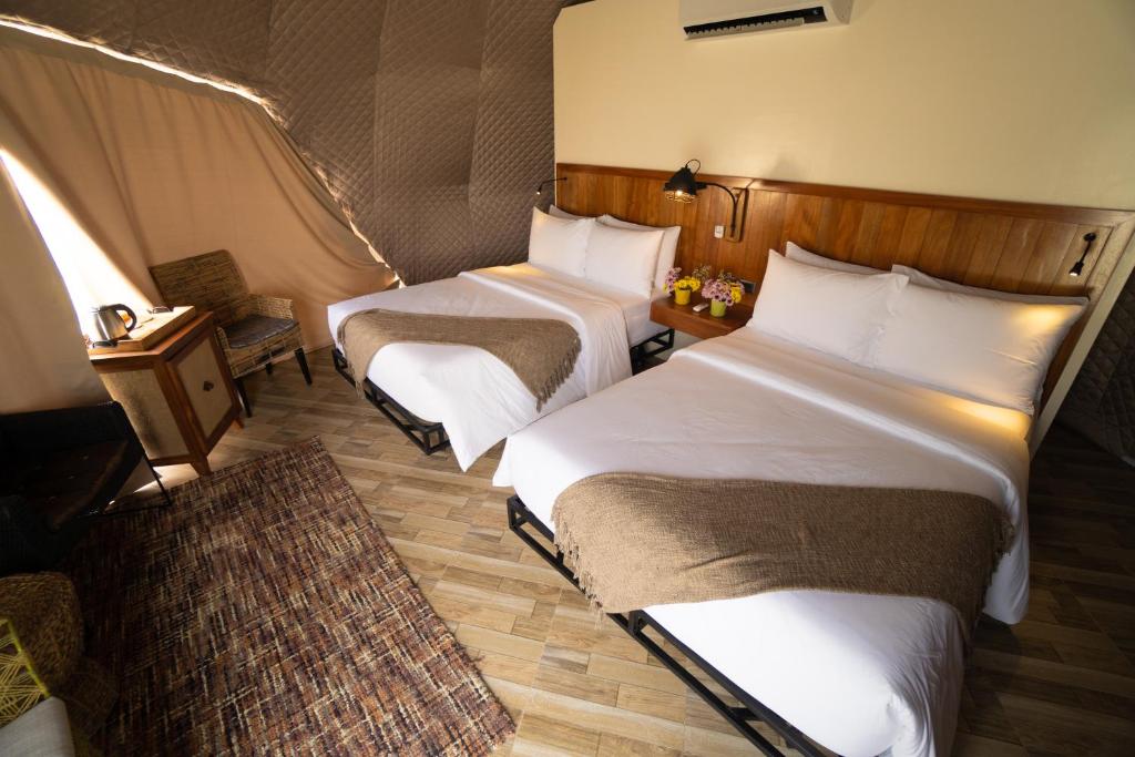 Postel nebo postele na pokoji v ubytování La Joya Farm Resort & Spa