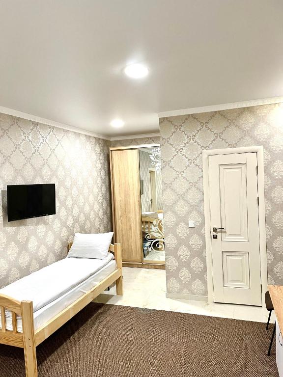 Postel nebo postele na pokoji v ubytování Park Hotel
