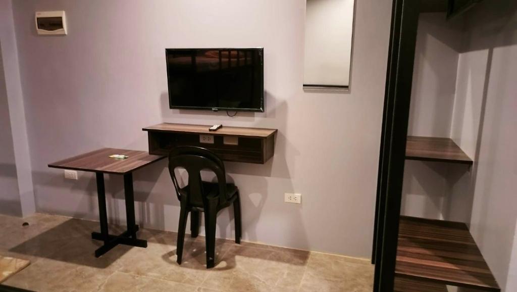 TV a/nebo společenská místnost v ubytování KM Pension