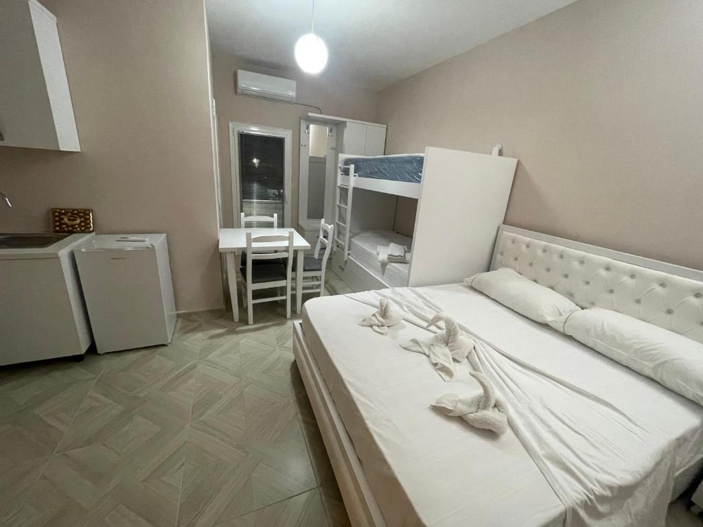 Postel nebo postele na pokoji v ubytování Vila Zini