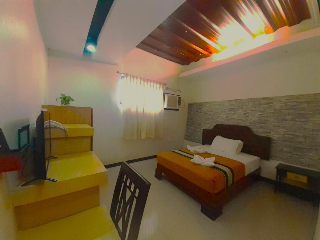 Postel nebo postele na pokoji v ubytování MelSol Hotel