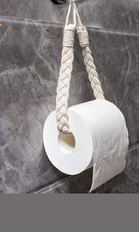 a roll of toilet paper hanging on a wall at Ángel in Campeche