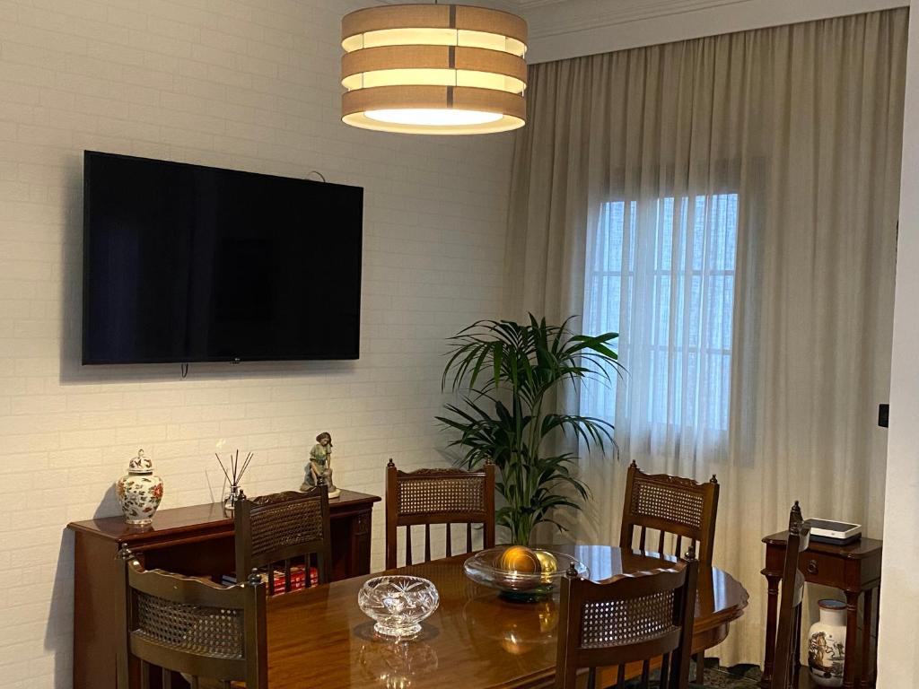 Televízia a/alebo spoločenská miestnosť v ubytovaní La Casa de Mami II
